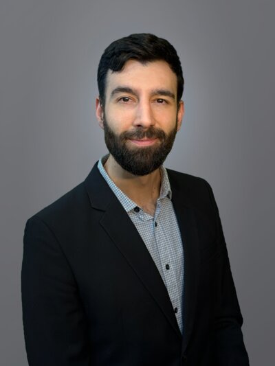 Marty Papamanolis, Managing Director of Devinium